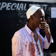 An injured Somali shopkeeper looks on outside his shop in the South African township of Soweto, South Africa Aug. 29, 2018.
